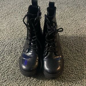 Girls lace-up combat boots .